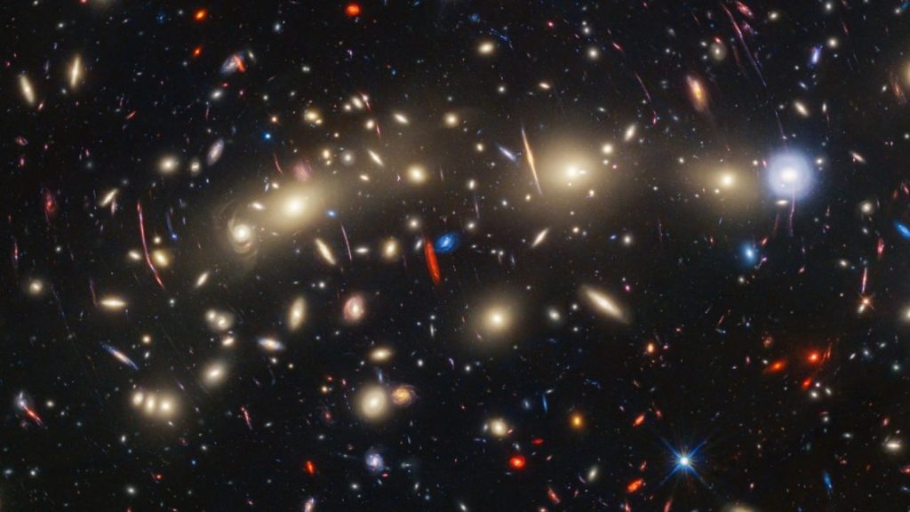 NASA’s Webb, Hubble Present an Enigmatic View of MACS0416, a Vibrant Cluster of Galaxies